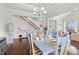 Elegant dining room with stylish lighting, a large table setting, and an open floor plan at 1715 Lake Egret Dr., North Myrtle Beach, SC 29582