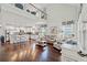 Open-concept living space features lots of natural light, hardwood floors, and stylish decor at 1715 Lake Egret Dr., North Myrtle Beach, SC 29582