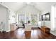 Bright home office with vaulted ceilings, hardwood floors, large windows, and ample workspace at 1715 Lake Egret Dr., North Myrtle Beach, SC 29582