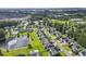 Neighborhood view featuring well-maintained homes, mature trees, and a scenic pond at 185 Rocko Dr., Myrtle Beach, SC 29579