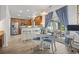 Bright kitchen and breakfast nook, featuring hardwood floors, stainless appliances and access to screened porch at 185 Rocko Dr., Myrtle Beach, SC 29579