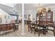 Open concept living and dining area with elegant decor and hardwood floors at 185 Rocko Dr., Myrtle Beach, SC 29579