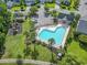 Aerial view of a neighborhood pool with a playground and ample seating at 185 Rocko Dr., Myrtle Beach, SC 29579