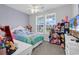 Bright bedroom with ample natural light, providing a comfortable and inviting space at 1898 Moonseed Dr., Longs, SC 29568