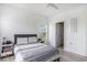 Bedroom featuring a double bed, ceiling fan, and a window at 2005 Silvercrest Dr. # 32F, Myrtle Beach, SC 29579
