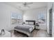 Bright bedroom with neutral walls, two windows, and light wood flooring at 2005 Silvercrest Dr. # 32F, Myrtle Beach, SC 29579
