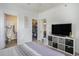 Bright bedroom featuring bathroom, closet, and tv cabinet at 2005 Silvercrest Dr. # 32F, Myrtle Beach, SC 29579