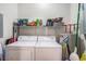 Efficient laundry room with washer, dryer, shelving and water heater at 2005 Silvercrest Dr. # 32F, Myrtle Beach, SC 29579