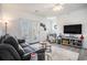Comfortable living room with modern furnishings and exterior access at 2005 Silvercrest Dr. # 32F, Myrtle Beach, SC 29579
