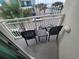 Private balcony with seating offering views of the surrounding cityscape and beachfront at 201 S Ocean Blvd. # 205, Myrtle Beach, SC 29577