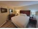 Inviting bedroom with a queen bed, dresser, and bedside tables at 201 S Ocean Blvd. # 205, Myrtle Beach, SC 29577