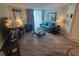 Comfortable living room with stylish decor and ample natural light at 201 S Ocean Blvd. # 205, Myrtle Beach, SC 29577