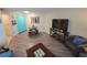 Comfortable living room with entertainment area, dining area and modern décor at 201 S Ocean Blvd. # 205, Myrtle Beach, SC 29577