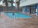 Outdoor pool area offering a refreshing escape with palm trees and lounge chairs at 201 S Ocean Blvd. # 205, Myrtle Beach, SC 29577