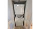 Convenient stackable washer and dryer tucked away behind closet doors at 201 S Ocean Blvd. # 205, Myrtle Beach, SC 29577