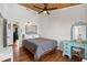 Bedroom featuring wood paneled ceiling and walls, a ceiling fan, and vanity at 204 55Th Ave. N, North Myrtle Beach, SC 29582