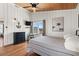 Charming bedroom featuring hardwood floors, a ceiling fan, nautical decor, and a striped bed at 204 55Th Ave. N, North Myrtle Beach, SC 29582