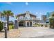 Inviting exterior of home featuring a charming front deck, convenient parking, and beachside vibe at 204 55Th Ave. N, North Myrtle Beach, SC 29582