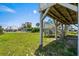Well-maintained lawn features stairs leading up to the elevated beach home at 204 55Th Ave. N, North Myrtle Beach, SC 29582