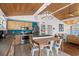 Bright kitchen with wood ceiling, stainless appliances, eat-in island and adjacent living area offer open living space at 204 55Th Ave. N, North Myrtle Beach, SC 29582