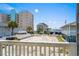 View of the street from the home showing the beach and neighboring houses at 204 55Th Ave. N, North Myrtle Beach, SC 29582