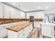 Gourmet kitchen with white cabinets, a center island with seating, and stainless steel appliances at 209 Haley Brooke Dr., Conway, SC 29526