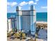 Aerial view of a beachfront condo building with a beautiful view of the Atlantic Ocean at 2300 N Ocean Blvd. # 132, Myrtle Beach, SC 29577