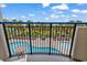 Balcony view of the pool and palm trees at 2300 N Ocean Blvd. # 132, Myrtle Beach, SC 29577