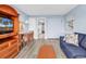 Living room with light blue walls and wood floors at 2300 N Ocean Blvd. # 132, Myrtle Beach, SC 29577