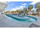 Resort-style pool with palm trees and lounge chairs, offering a luxurious vacation experience at 2300 N Ocean Blvd. # 132, Myrtle Beach, SC 29577
