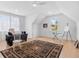 Bright bedroom featuring hardwood floors, recessed lighting, an artist's easel and desk at 2313 Summersweet Ln., Myrtle Beach, SC 29579