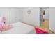 Cozy bedroom featuring a teddy bear on the bed and pink accents at 2313 Summersweet Ln., Myrtle Beach, SC 29579