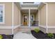 Charming front porch featuring a cozy seating area and a welcoming entrance at 2313 Summersweet Ln., Myrtle Beach, SC 29579