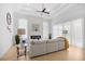 Bright living room with fireplace, neutral decor, and large windows offering scenic views at 2313 Summersweet Ln., Myrtle Beach, SC 29579
