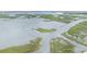Breathtaking aerial view of winding waterways through lush marshland, showcasing the area's natural beauty at 247 Grove Park Grove Park Loop, Murrells Inlet, SC 29576
