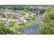 Aerial view of the Grove Park community with winding roads and water features at 247 Grove Park Grove Park Loop, Murrells Inlet, SC 29576
