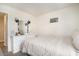 Bedroom featuring neutral decor, large dresser, and natural light at 247 Grove Park Grove Park Loop, Murrells Inlet, SC 29576
