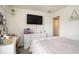 Bedroom features modern decor, dresser, and mounted TV for relaxation at 247 Grove Park Grove Park Loop, Murrells Inlet, SC 29576