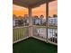 Enjoy sunset views of the community pool from this cozy condo balcony at 2498 Coastline Ct. # 301, Murrells Inlet, SC 29576