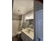 Clean bathroom featuring a shower with a full size washing machine and dryer at 2498 Coastline Ct. # 301, Murrells Inlet, SC 29576