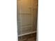 Walk-in closet featuring built-in shelving for optimal organization and wood-look flooring at 2498 Coastline Ct. # 301, Murrells Inlet, SC 29576