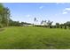 Enjoy a vast backyard with a shed, playset, and lush green grass at 2554 Dogwood Rd., Longs, SC 29568