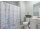 Bathroom with seashell shower curtain and matching decor at 2554 Dogwood Rd., Longs, SC 29568