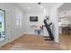 Versatile bonus room featuring a TV, exercise equipment, and direct access to the outdoors at 2554 Dogwood Rd., Longs, SC 29568
