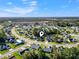 Community aerial view showcasing property with a pond, landscaping, and the surrounding neighborhood at 2715 Wood Creek Ln., Conway, SC 29527