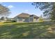 Spacious backyard with patio area, perfect for outdoor entertaining and relaxation at 2715 Wood Creek Ln., Conway, SC 29527