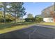 Backyard with patio, seating and pond view, perfect for outdoor entertaining and relaxation at 2715 Wood Creek Ln., Conway, SC 29527