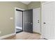 Inviting entryway with an open door, showcasing wood flooring and a view to the exterior at 2715 Wood Creek Ln., Conway, SC 29527