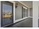 Inviting front door with decorative glass and sidelight, adding to the home's curb appeal at 2715 Wood Creek Ln., Conway, SC 29527
