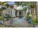 View of the home's back patio with a grill, seating area, and potted plants at 2738 Canvasback Trail, Myrtle Beach, SC 29588